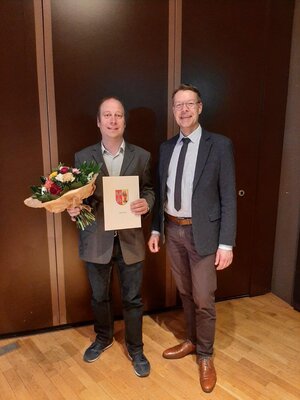 Gratulation von Henning Fricke zum 25-jähriges Dienstjubiläumvon Andreas Scholz